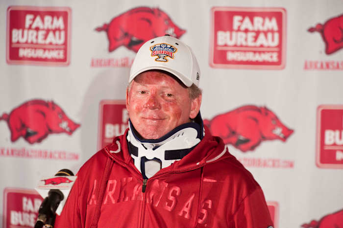 Former Arkansas coach Bobby Petrino addressing the media after his motorcycle crash in 2012.